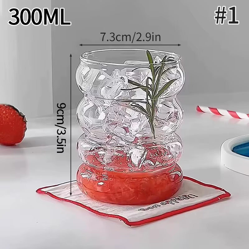 Elegant Glass Drinkware for Cold Beverages - Latte Cups, Iced Water Bottles, and Wine Cocktail Glasses