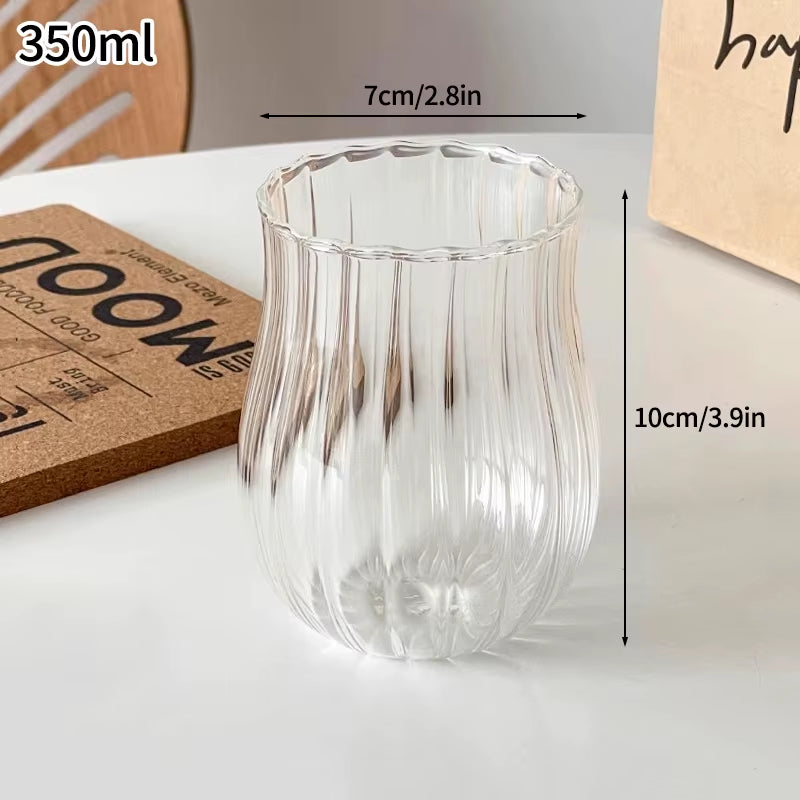 Elegant Glass Drinkware for Cold Beverages - Latte Cups, Iced Water Bottles, and Wine Cocktail Glasses